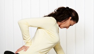 A woman with back pain